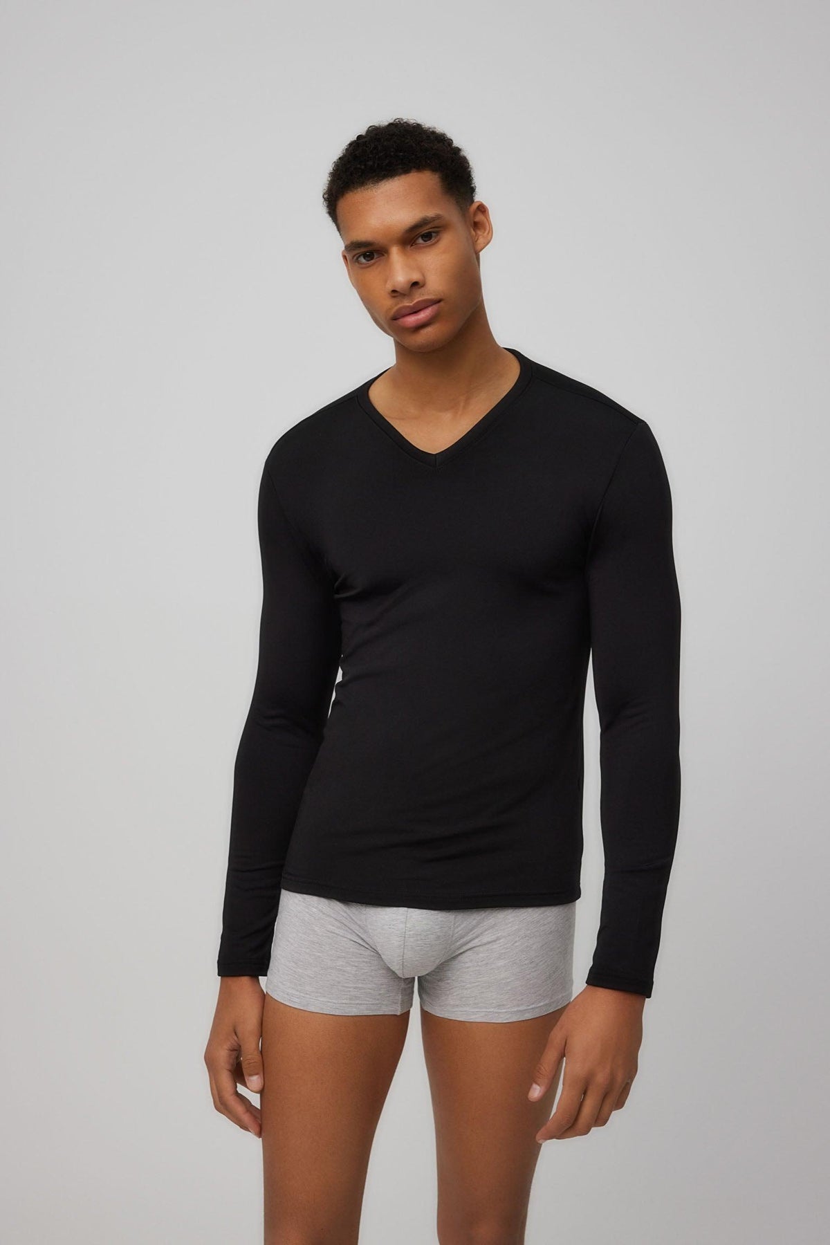 Camiseta térmica interior cuello en V manga larga negra